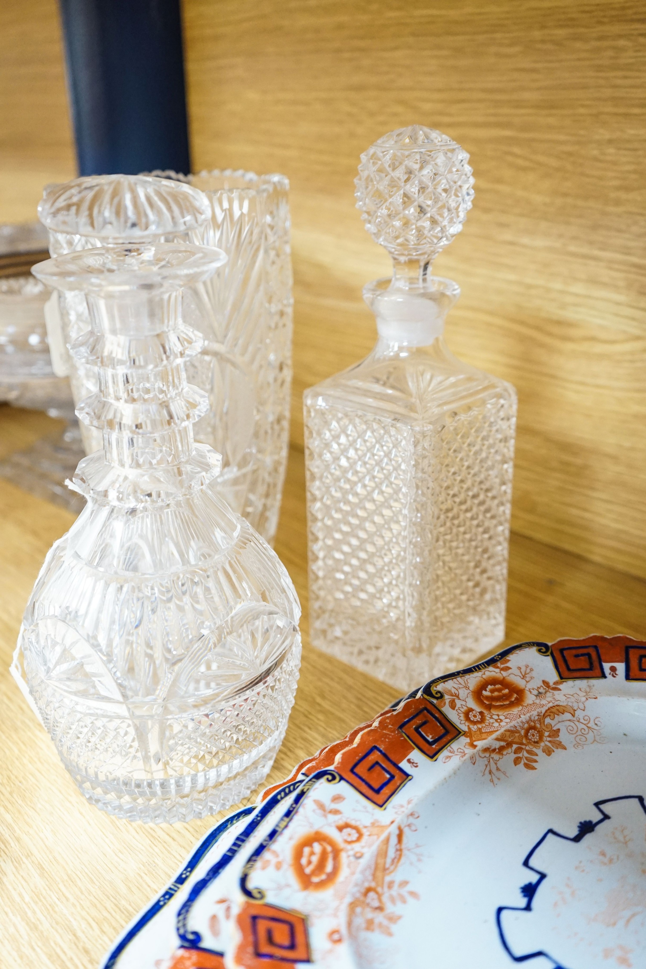 A cut crystal circular pedestal bowl, another similar bowl and sundry glassware